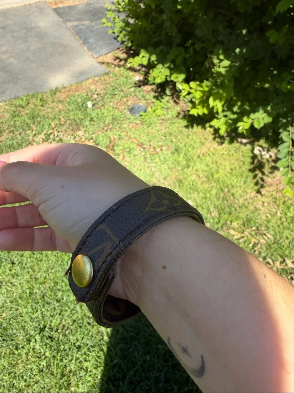 Louis Vuitton leather strap bracelet